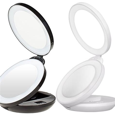 The entire mirror also weighs less than 7 ounces, so its easy to carry. . Lighted travel makeup mirror